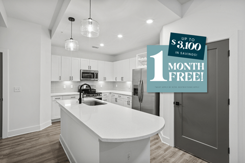 Kitchen with Quartz Countertop and Stainless Steel Appliances.