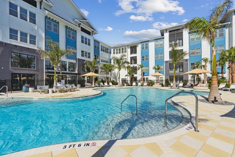 Resort-Style Pool with Sun Shelf and Grilling