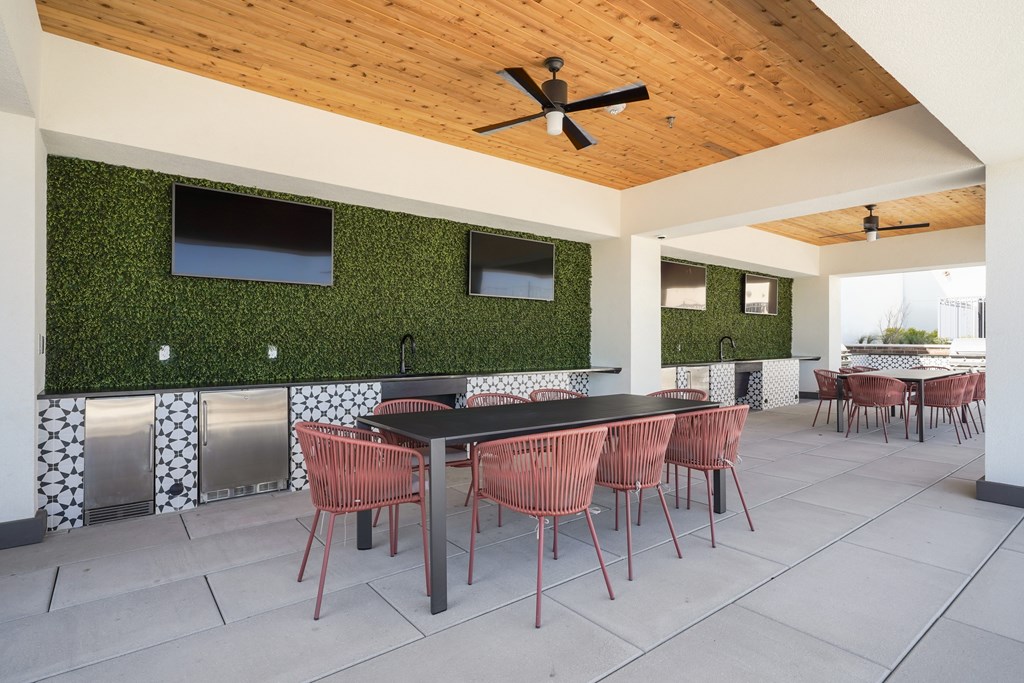 Rooftop Lounge with TVs, Kitchen & Bar Area