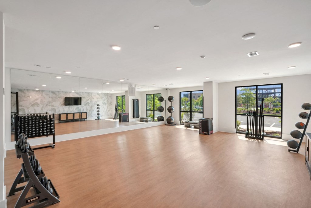 the home has an open floorplan with a yoga room and a fireplace