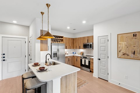 Kitchen with Quartz Countertop and Stainless Steel Appliances