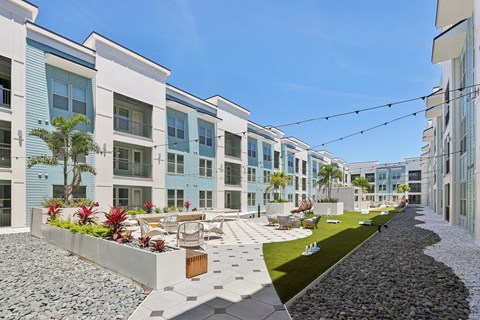 Social Deck with Grilling Stations, TVs, Cabanas, and Bocce Ball