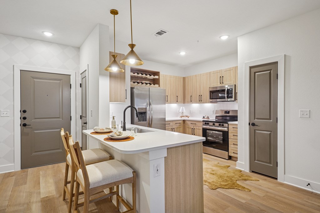 Kitchen with Quartz Countertop and Stainless Steel Appliances