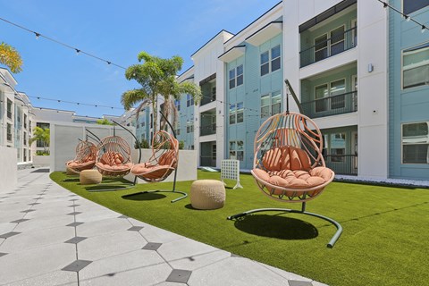 Social Deck with Grilling Stations, TVs, Cabanas, and Bocce Ball