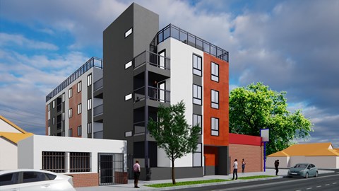 A modern apartment building with a mix of brick and panel construction.
