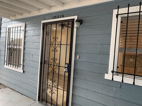 A door with a window on either side.