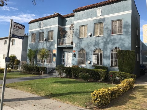 A blue building with a sign that says DASH.