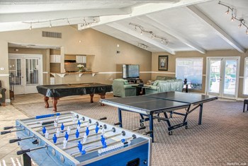 The Clubhouse at Torrey Ridge Apartments offers foosball, billiards, and ping-pong tables. - Photo Gallery 4