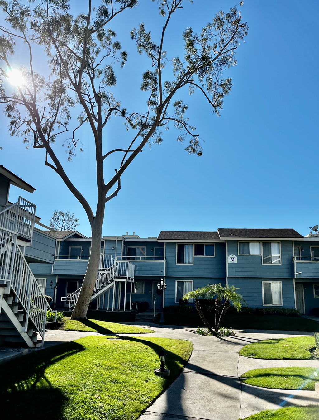 a view of the exterior of a building at the whispering winds apartments in pearland