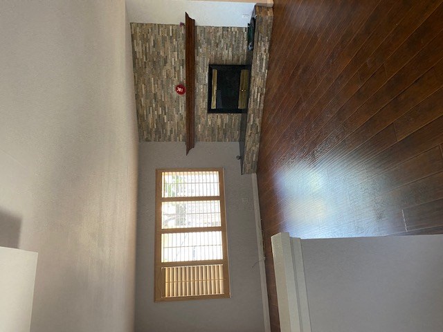 a room with a reflection of a mirror on the floor