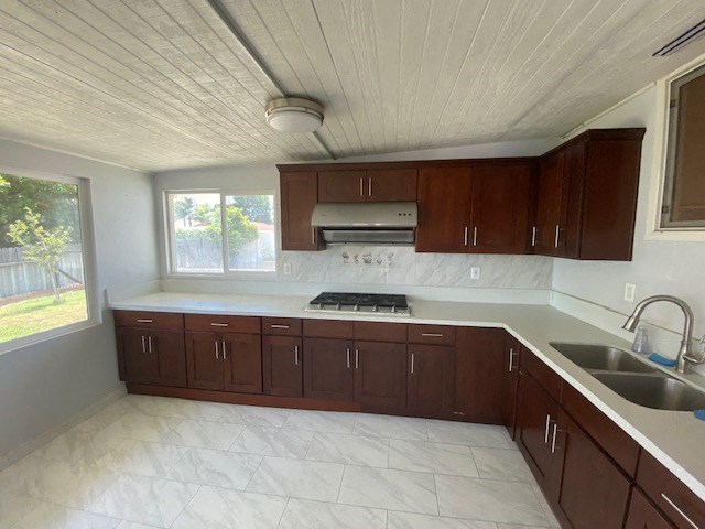 a colorful geometric pattern with stripes and dots on a