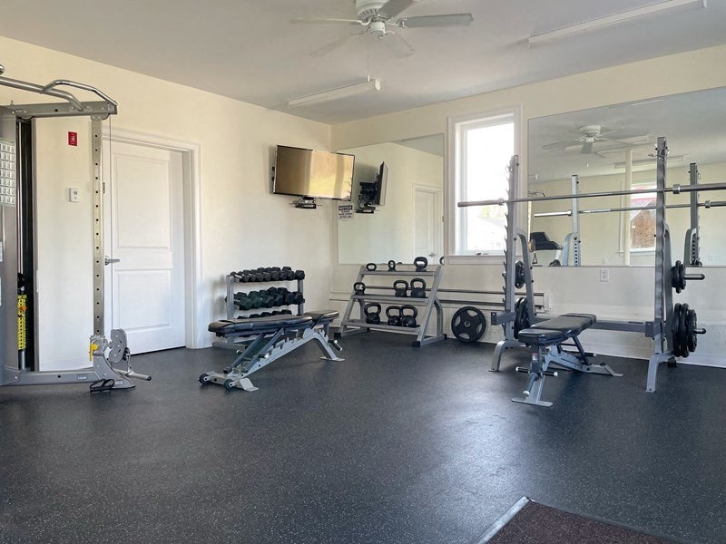 the fitness room is clean and ready for the guests to use