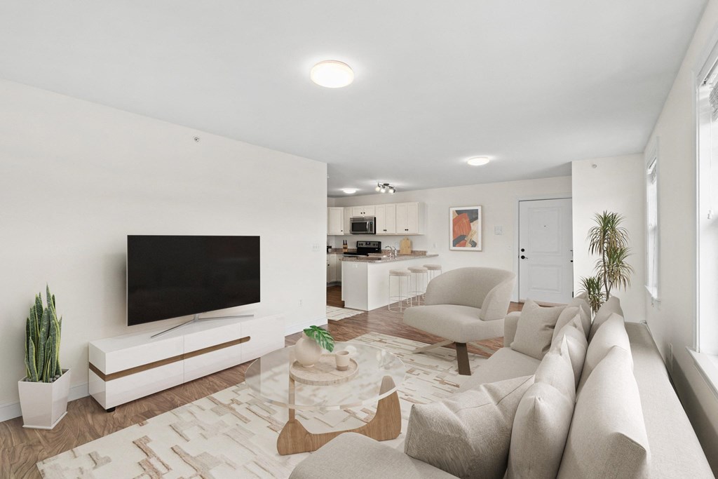 a living room with a couch and a tv