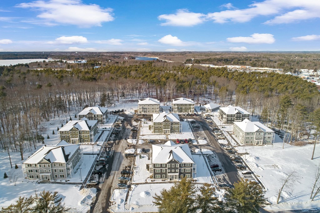 arial view of the buildings of a resort in the snow