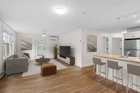 a living room with a couch and a table