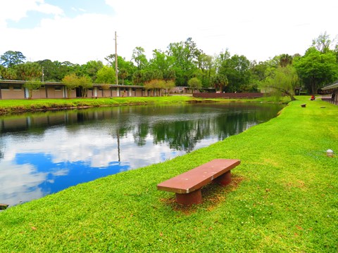 Lake view and a bench at Golden Shores of Jacksonville Jacksonville, FL, 32211
