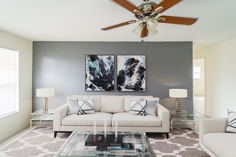 a living room with a couch and a coffee table