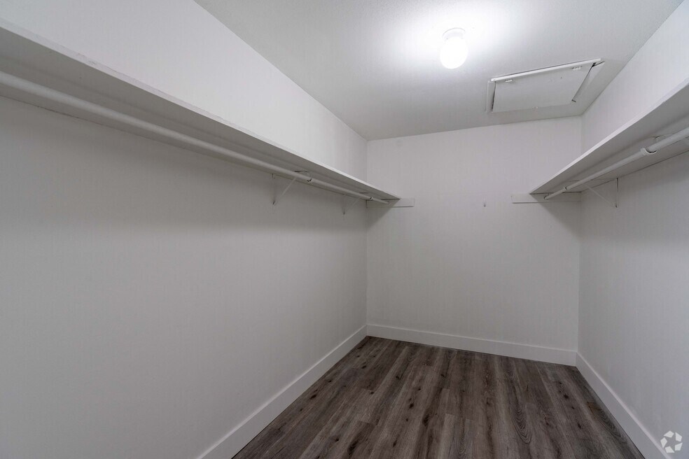an empty room with white walls and white shelves at Red Bay Apartment Complex, Jacksonville, FL, 32211