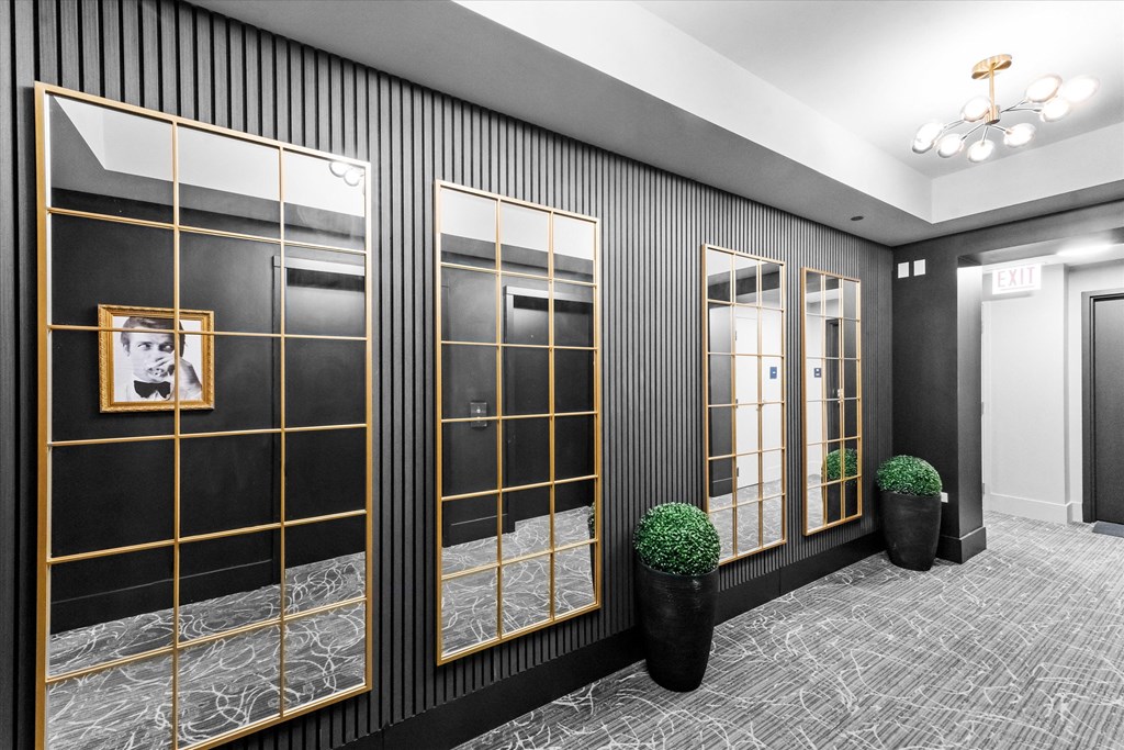 Renovated hallways corridors near elevators and apartments at Chateau on Wells, Chicago