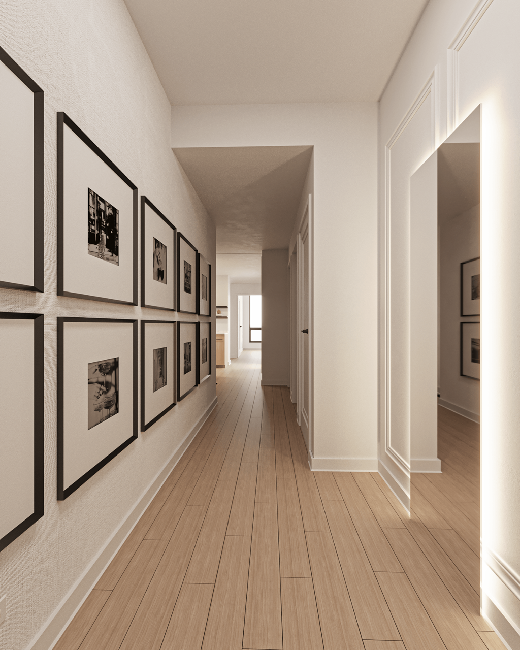 a hallway with black and white photos on the wall and wooden floors at Chateau on Wells, Chicago, IL
