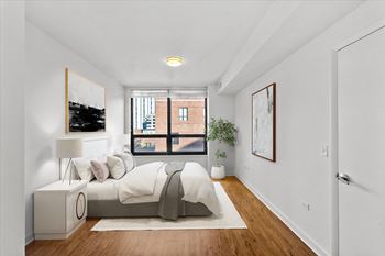 Wooden floor bedroom at Chateau on Wells, Chicago, Illinois