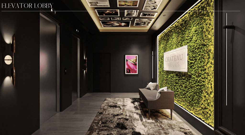 a living wall of moss in a lobby with a chair at Chateau on Wells, Illinois, 60654