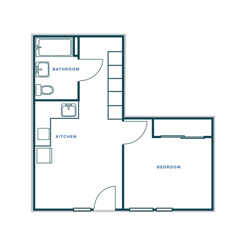 A floor plan of a room with a kitchen, bathroom and bedroom.