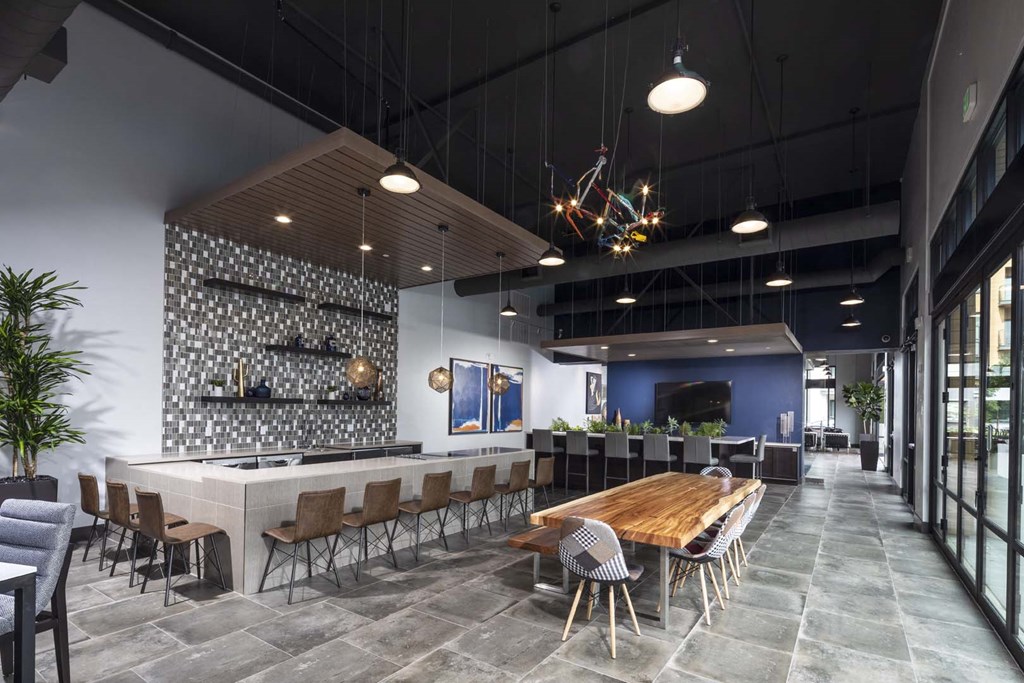 a large room with a long table and chairs