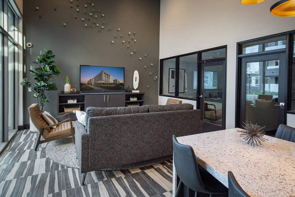 a living room with a couch and a table