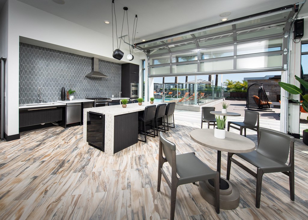 a large open space with a kitchen and dining area