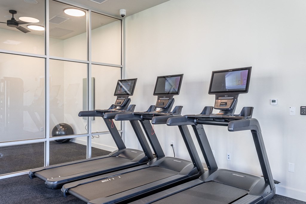 cardio equipment in the fitness room at trillium apartments at Arlington Farms, Greenwood, IN