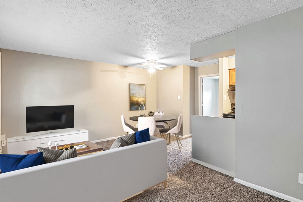 a living room with a couch a table and a tv at Caballo Crossing, Lexington, KY, 40511