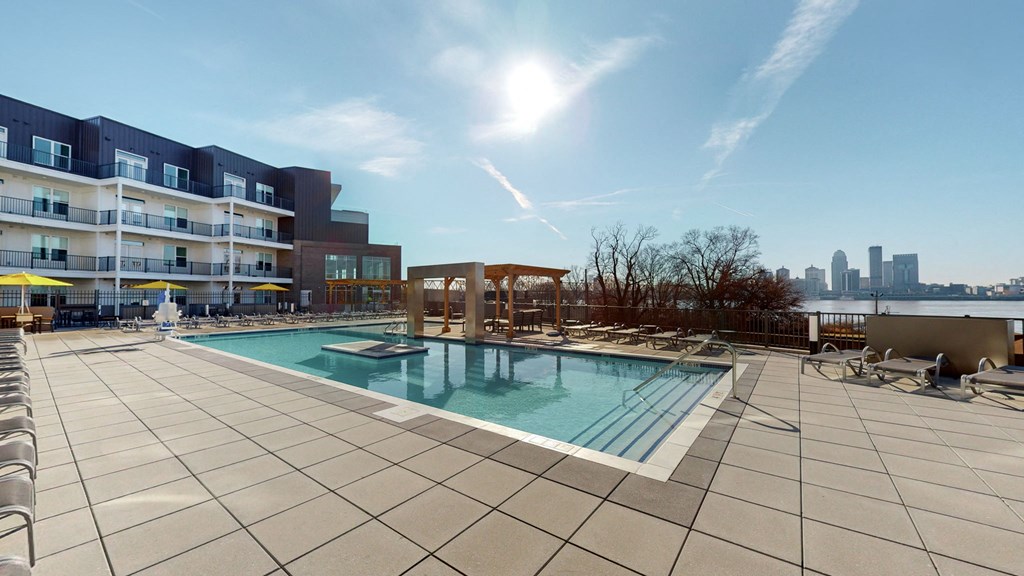 a swimming pool with a city in the background at a condominium buildingat Current812, Indiana, 47129