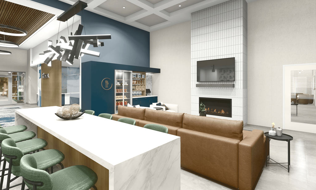 a living room with blue walls and a white table with green chairs