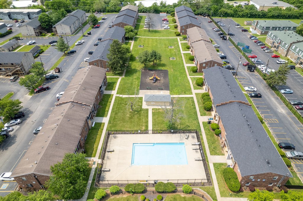 an aerial view of a row of houses with a basketball court in the middle of the yard at Caballo Crossing, Kentucky