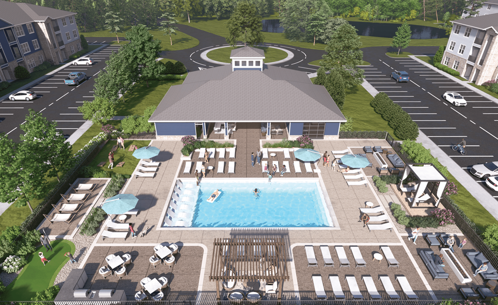 an aerial view of a swimming pool at an apartment complex