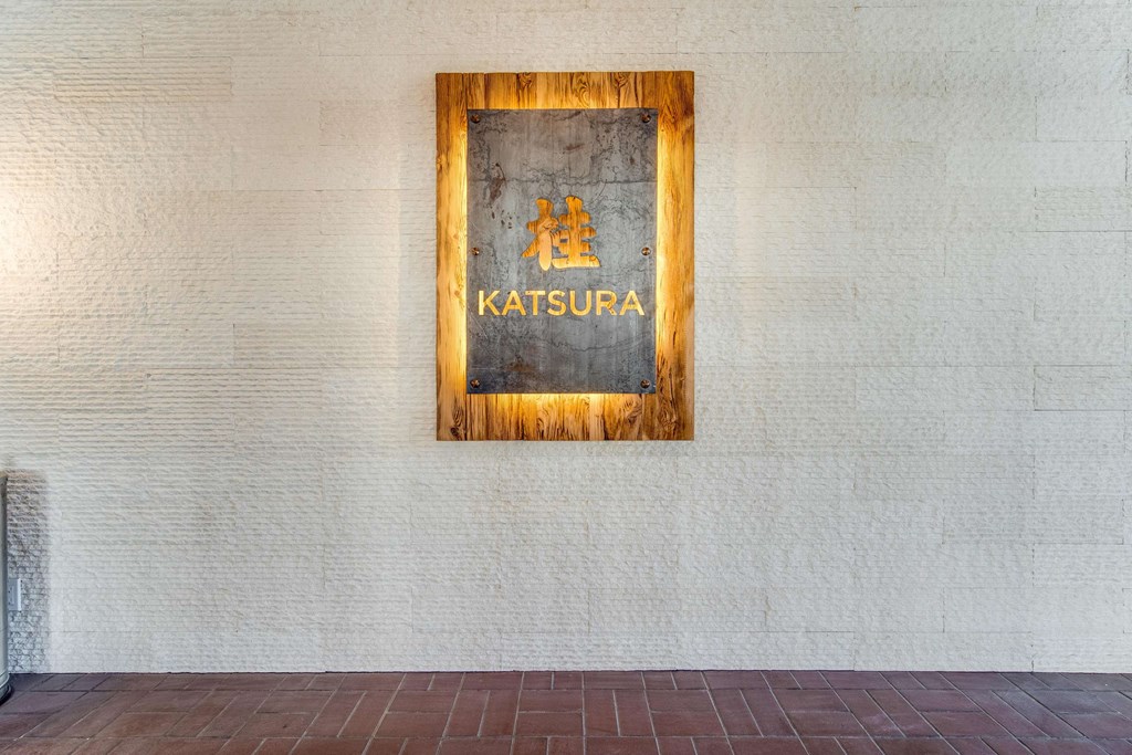 a window with a sign on the side of a building