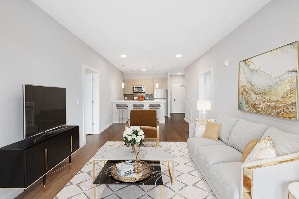 a living room with a couch and a table