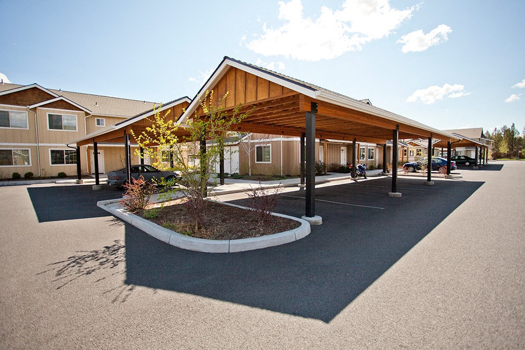 a parking lot with a building in the background