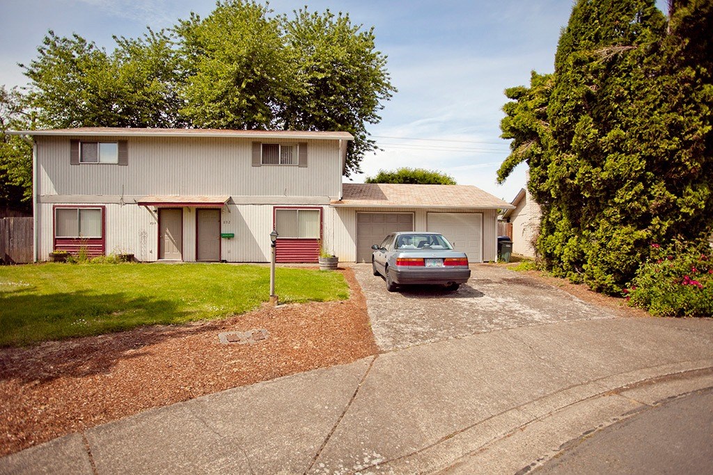 a car parked in front of a house