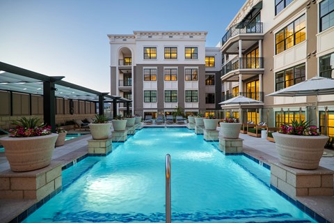 A long rectangular pool with a diving board in the middle.