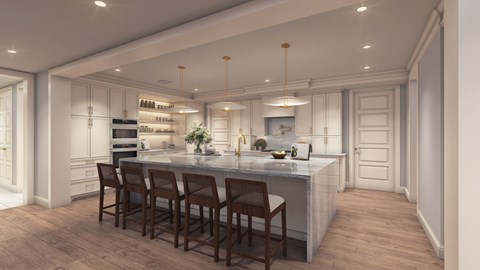 A kitchen with a table and chairs in front of a counter.