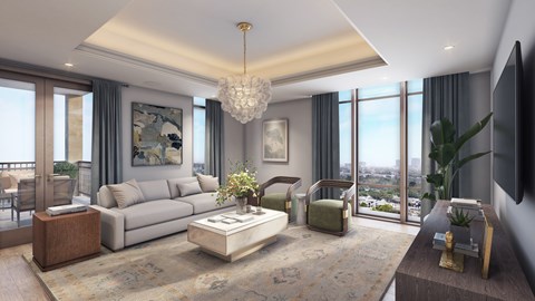 A modern living room with a large window overlooking the city.