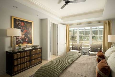 A living room with a large painting on the wall and a long sofa.