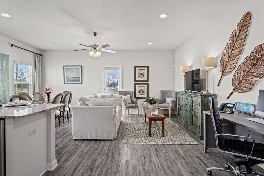 a living room with a couch and a tv