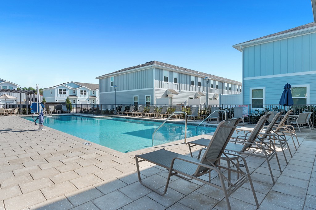 take a dip in the resort style pool at the enclave at woodbridge apartments in sugar land