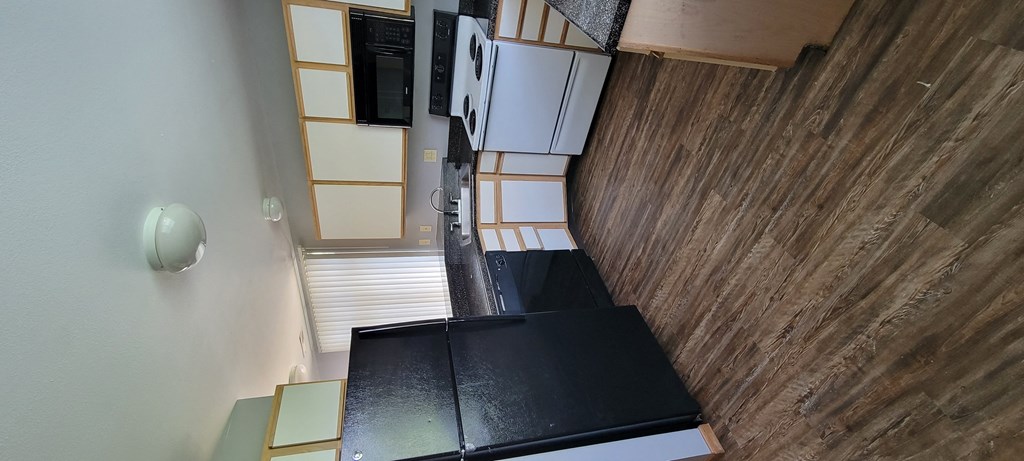 a look down at the kitchen from the loft