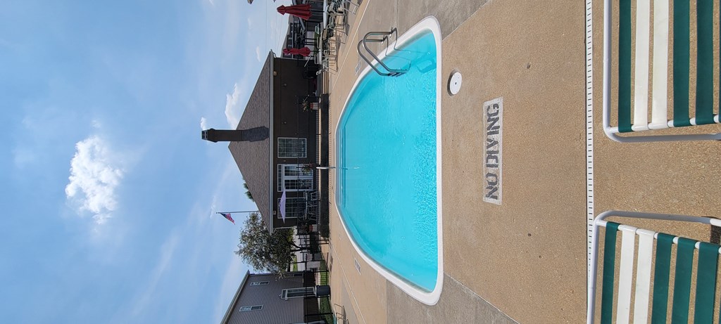 a view of the pool from the top of the building