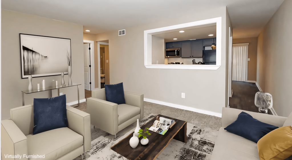 a living room with couches and a coffee table