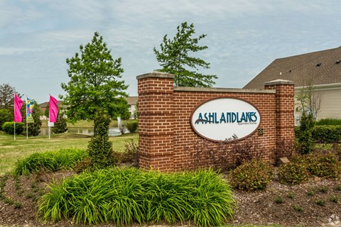 A sign that says Ashland Lanes in front of a building.